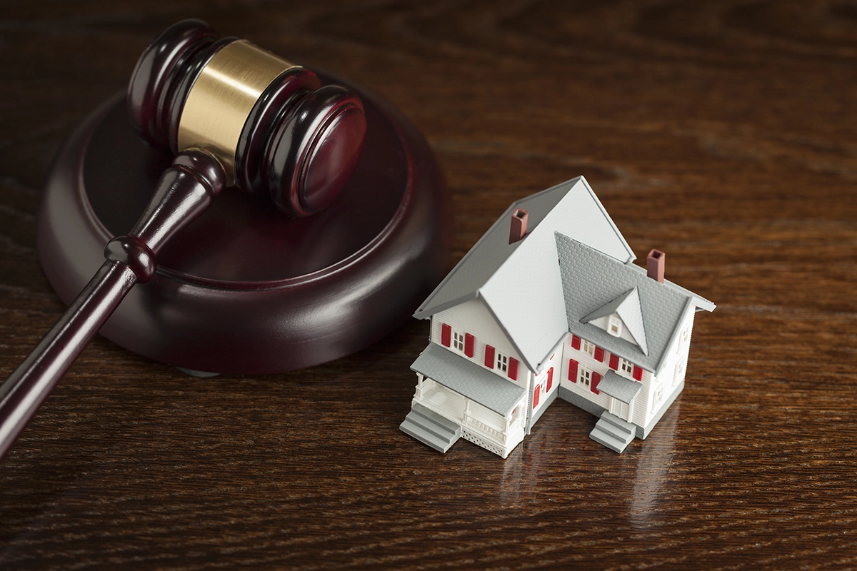 small house model and gavel small house model and gavel